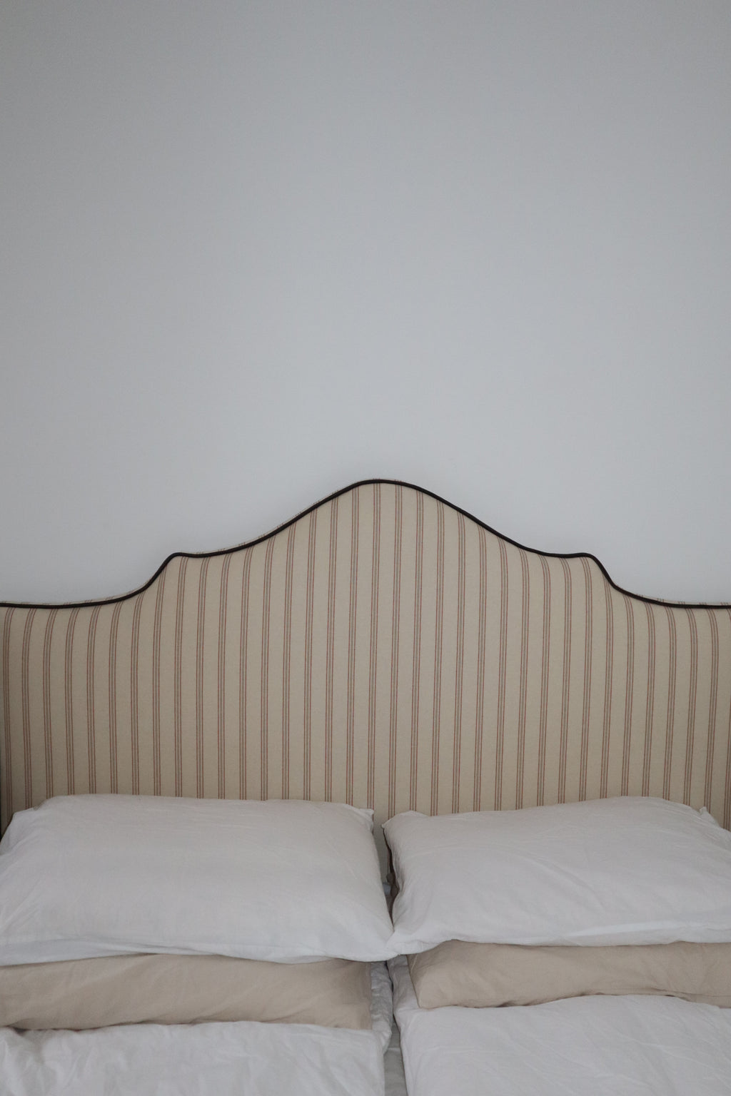 Beige fabric with red stripes and brown velvet piping