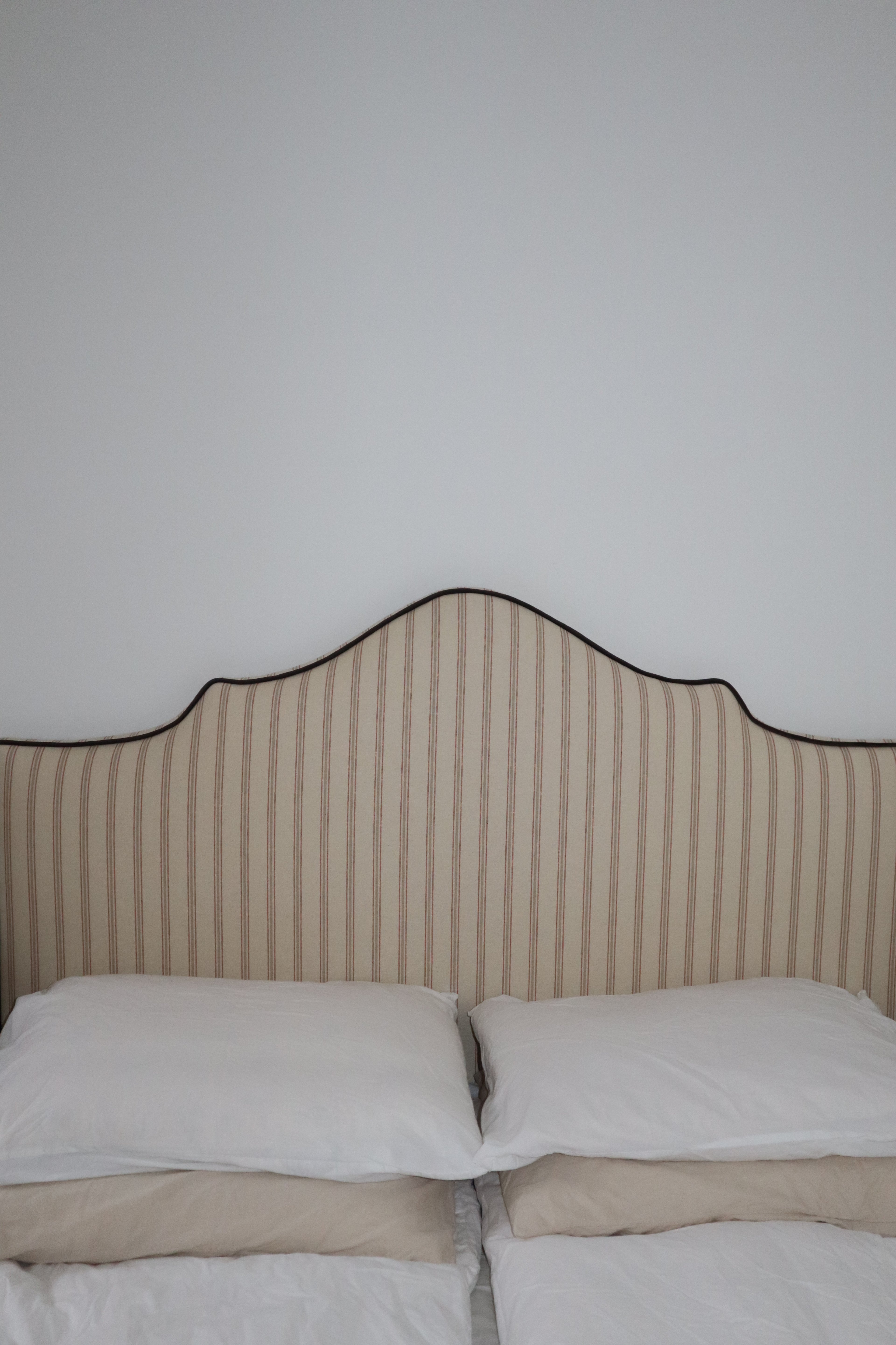 Beige fabric with red stripes and brown velvet piping